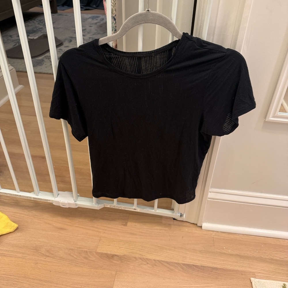 Women’s Negative ribbed baby tee in black